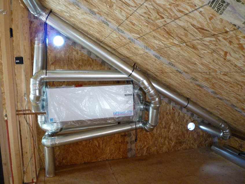 A heat recovery ventilator   (HRV) in a net zero home