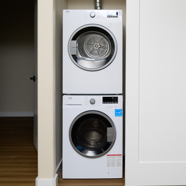 A photo of a stacked washer and dryer from Beko with an EnergySTAR sticker on the front of the washer.